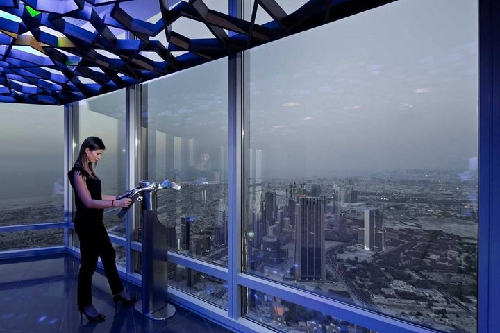Gaze out from the world’s tallest building where sweeping views of Dubai's skyline and beyond blend seamlessly with the modern architecture of Burj Khalifa offering an unforgettable experience.